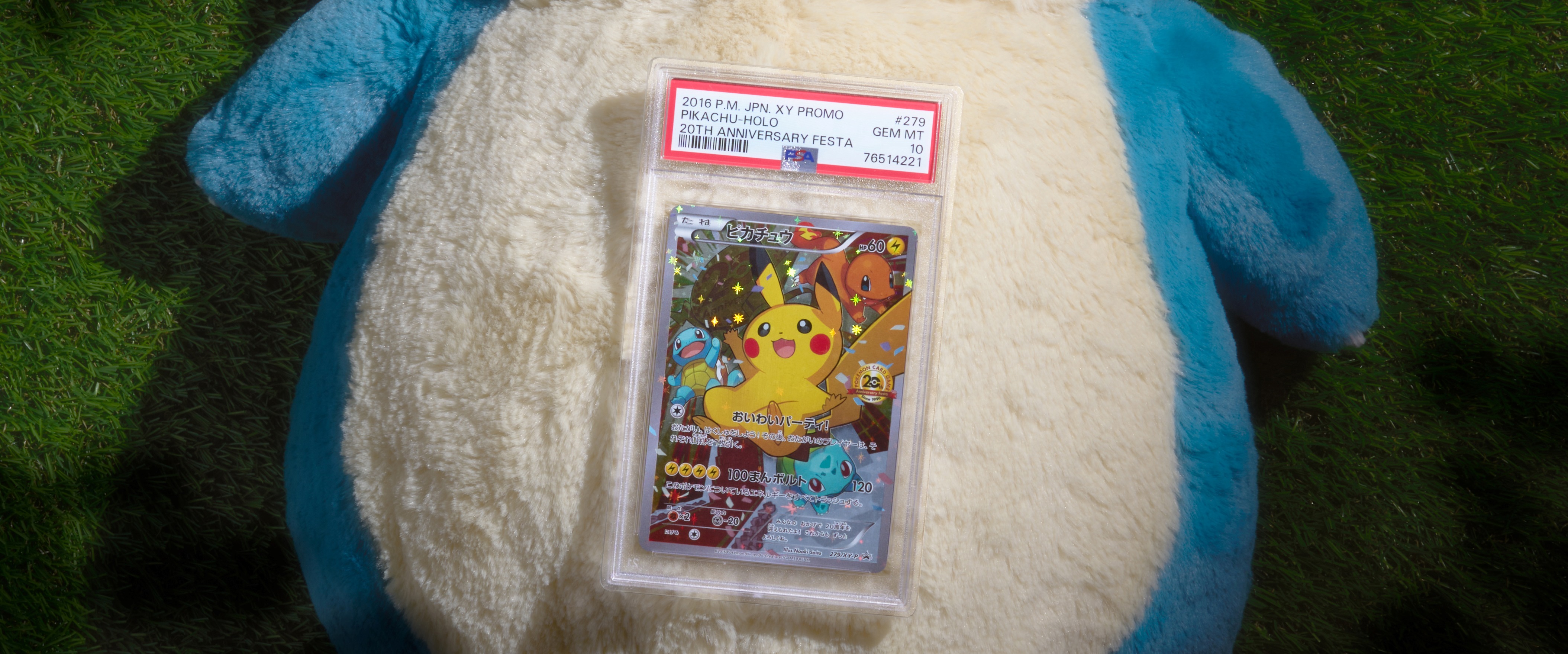 An image of a pokemon card resting on a plush Snorlax, used on a coompany instagram account to advertise a sale. shot by TayStudios.